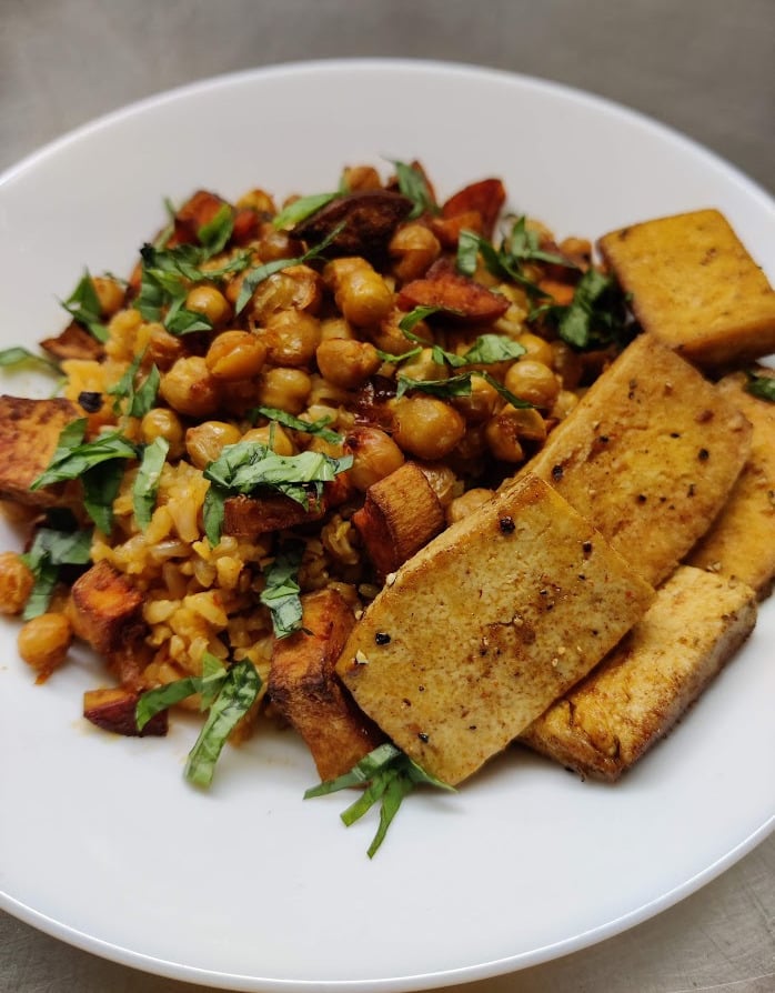 Close-up of chickpea, rice, and mushroom dish