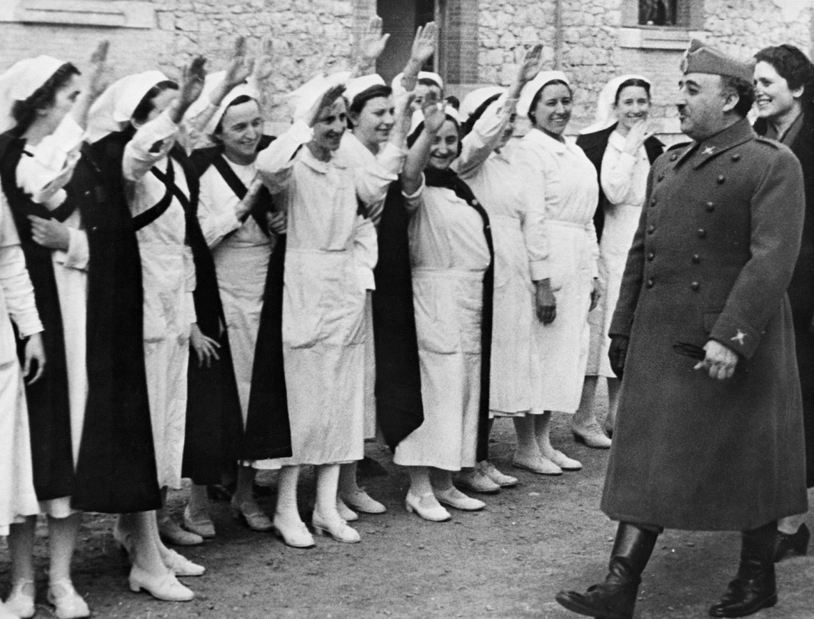Nurses giving the Nationalist salute to General Francisco Franco, the leader of the fascist forces during the Spanish Civil War, 1938