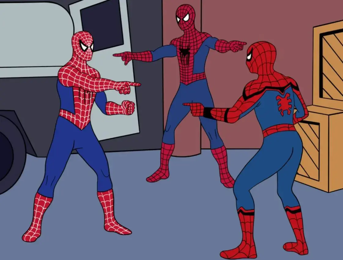 three people in spideman costumes pointing at each other